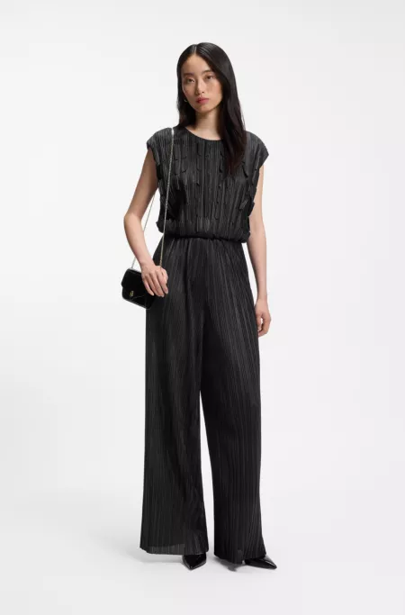 Plissé jumpsuit with laser-cut scallop detailing