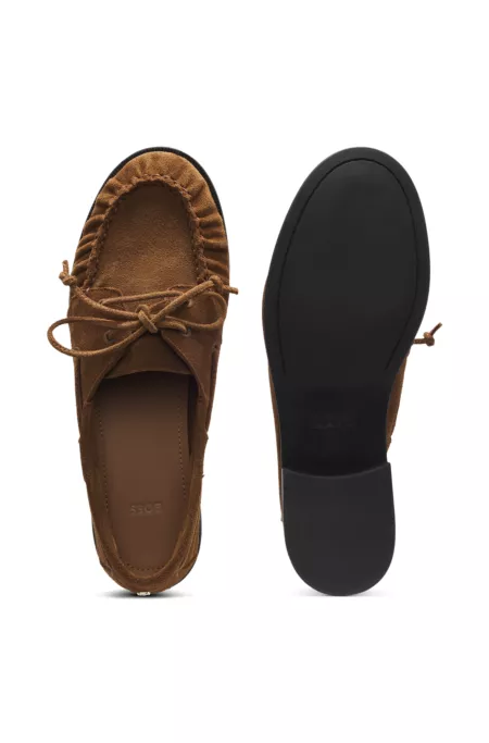 Suede moccasins with hand-stitched apron toe