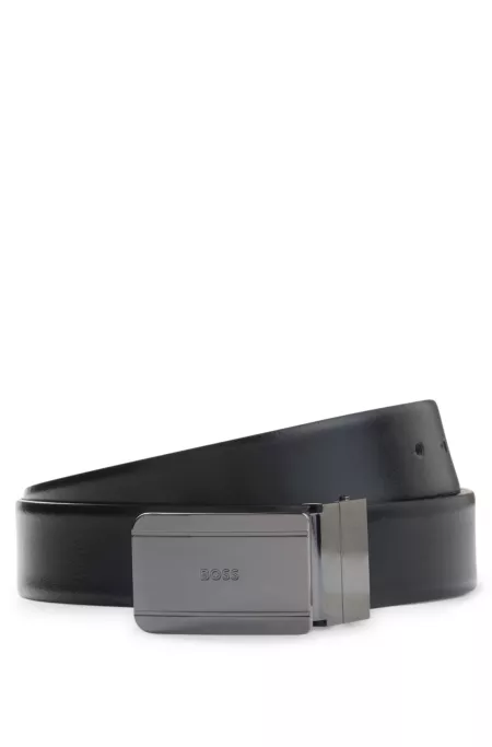 Reversible leather belt with pin and plaque buckles