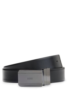 Reversible leather belt with pin and plaque buckles
