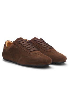 Suede trainers with embossed logo