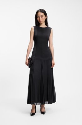 Sleeveless dress in crepe with plissé skirt