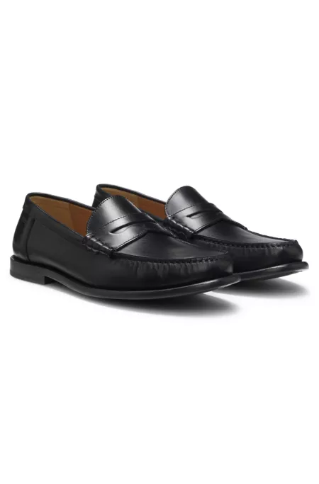 Leather moccasins with penny trim