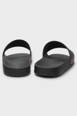 Italian-made slides with repeat-logo print, Black
