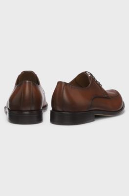 Chaussures derby en cuir avec logo en relief, Marron