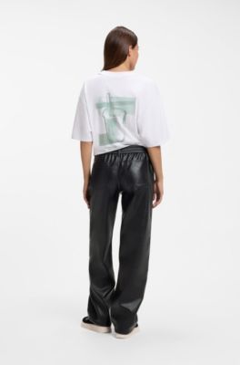 Pantaloni relaxed fit in similpelle con tasche applicate, Nero