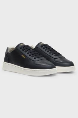 Leather trainers with gold-tone logo, Black