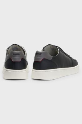 Leather trainers with gold-tone logo, Black