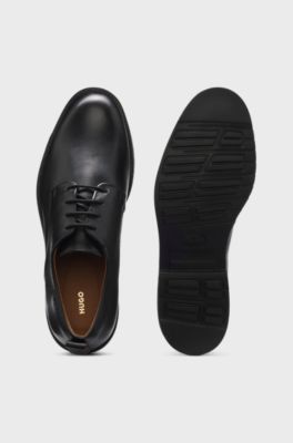 Leather Derby shoes with brogue details, Black