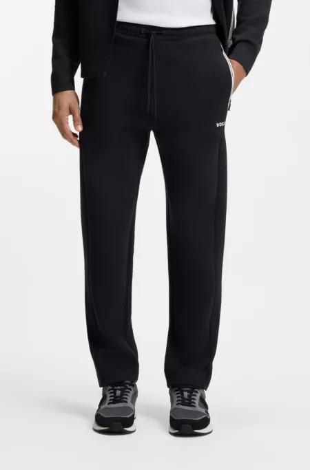Drawstring trousers in cotton-blend jersey