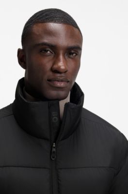 Water-repellent puffer jacket with zipped sleeve pocket, Black