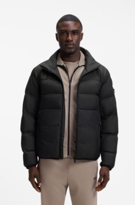 Water-repellent puffer jacket with zipped sleeve pocket, Black