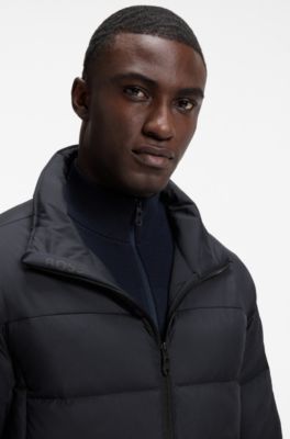 Water-repellent puffer jacket with zipped sleeve pocket, Dark Blue