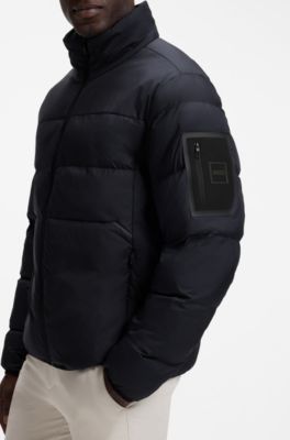Water-repellent puffer jacket with zipped sleeve pocket, Dark Blue