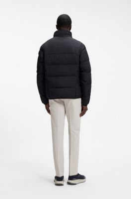 Water-repellent puffer jacket with zipped sleeve pocket, Dark Blue
