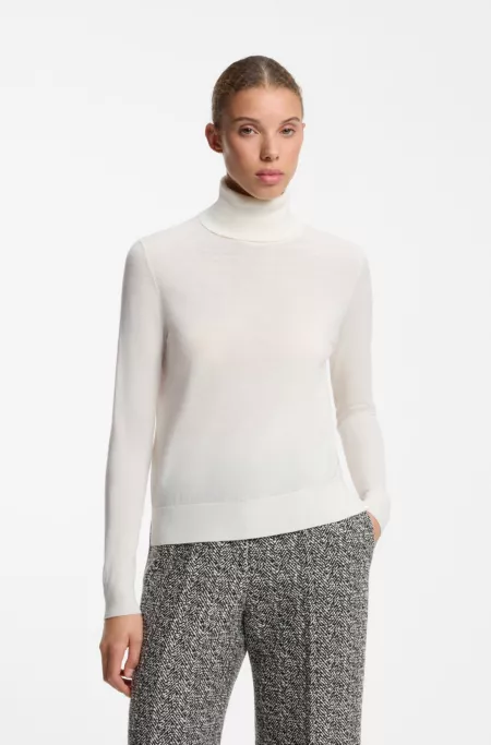 Pull à col roulé en laine mélangée et cachemire