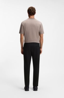 Regular-fit tracksuit bottoms with four-way stretch, Black