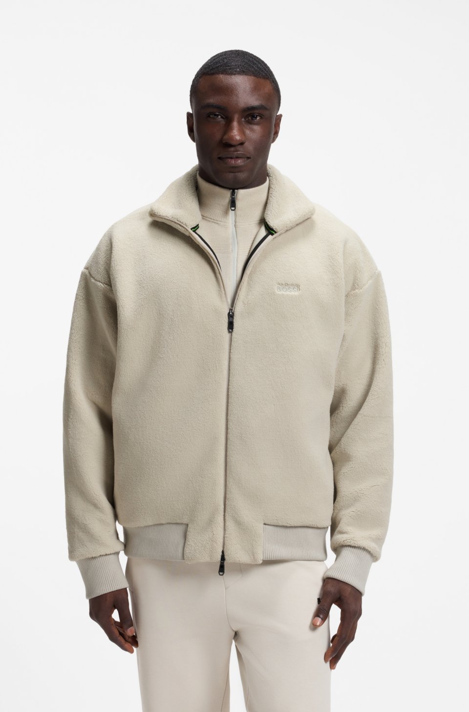 Logo-embroidered zip-up sweatshirt in teddy fleece