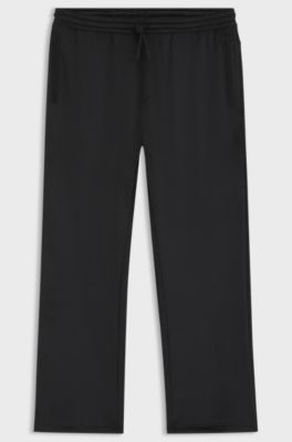 Relaxed-fit tracksuit bottoms in stretch corduroy, Black