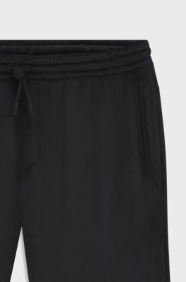 Relaxed-fit tracksuit bottoms in stretch corduroy, Black