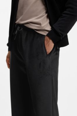 Relaxed-fit tracksuit bottoms in stretch corduroy, Black