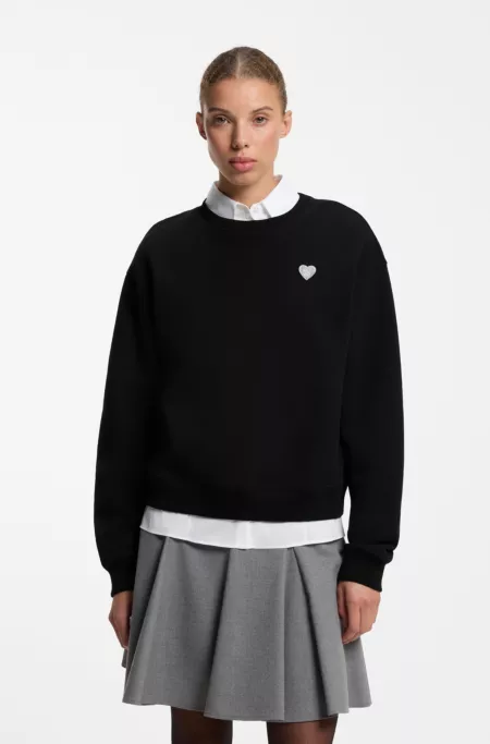 Sweat en coton avec étiquette logotée à cœur pailleté