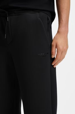 Porsche x BOSS Pantaloni della tuta in jersey elasticizzato con logo, Nero