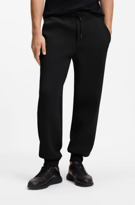Porsche x BOSS stretch-jersey tracksuit bottoms with logo, Black