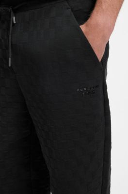 Porsche x BOSS tracksuit bottoms with Pasha pattern, Black