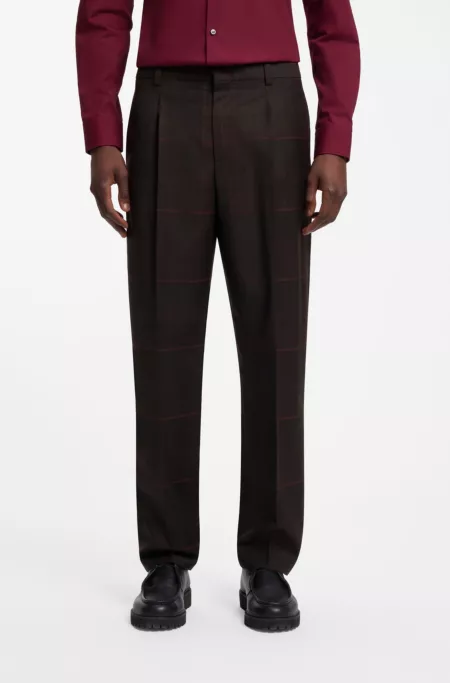 Pantalon Slim en laine vierge à carreaux emblématiques de la maison