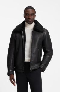 Veste en cuir grain&eacute; avec col en peau retourn&eacute;e, Noir