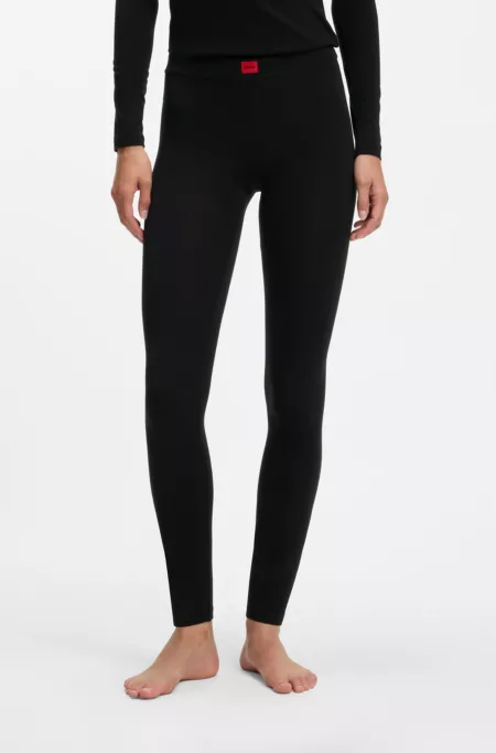 Slim-fit leggings with red woven logo label