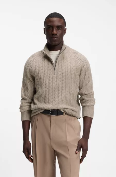 Zip-neck sweater with an all-over cable pattern