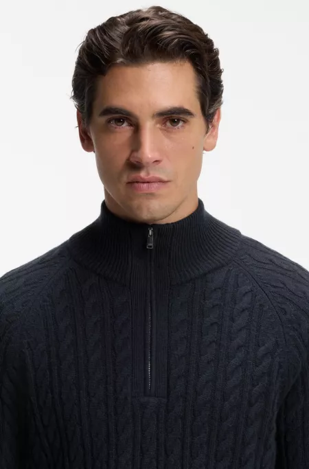 Zip-neck sweater with an all-over cable pattern