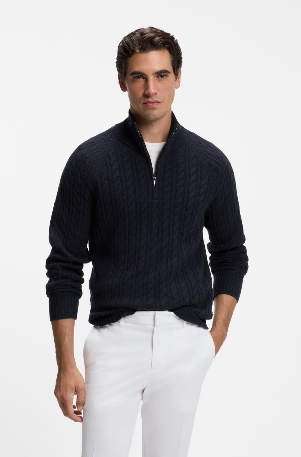 Zip-neck sweater with an all-over cable pattern