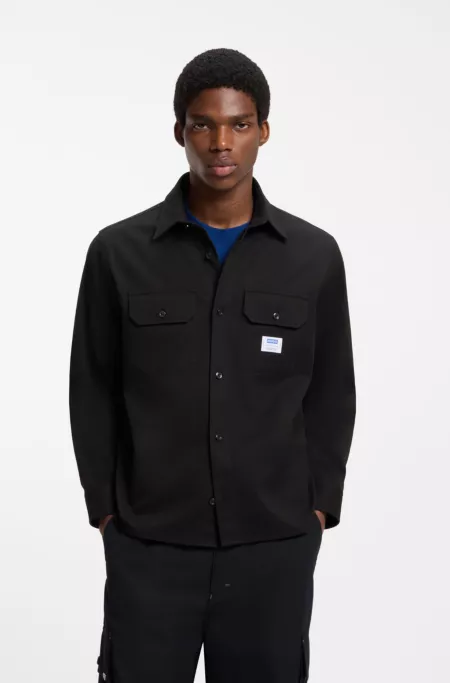 Oversized-fit shirt in cotton with flap chest pockets