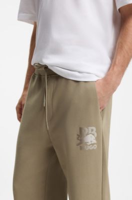 HUGO x RB tracksuit bottoms with bull motif, Light Brown
