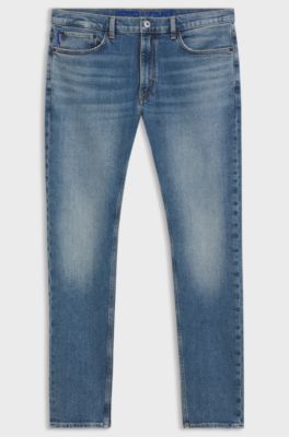 Skinny-fit jeans in stonewashed blue stretch denim, Blue