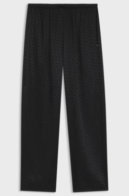 Pyjama trousers in satin with all-over monogram pattern, Black