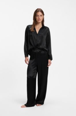 Pyjama trousers in satin with all-over monogram pattern, Black