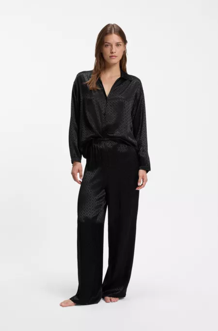 Pyjama trousers in satin with all-over monogram pattern