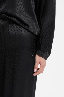 Pyjama trousers in satin with all-over monogram pattern, Black