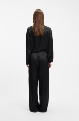 Pyjama trousers in satin with all-over monogram pattern, Black