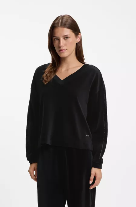 V-neck sweatshirt in ribbed velour with satin piping
