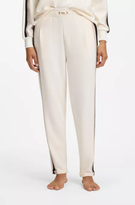Tracksuit bottoms with signature-stripe details