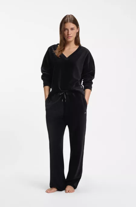 Velour tracksuit bottoms with satin inserts