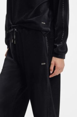 Velour tracksuit bottoms with satin inserts, Black