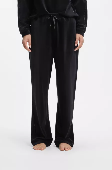 Velour tracksuit bottoms with satin inserts
