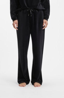 Velour tracksuit bottoms with satin inserts