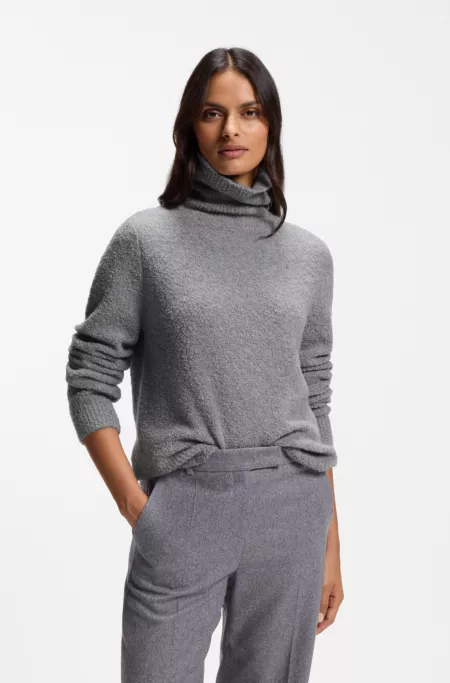 Pull à col roulé en mélange de laine vierge bouclée